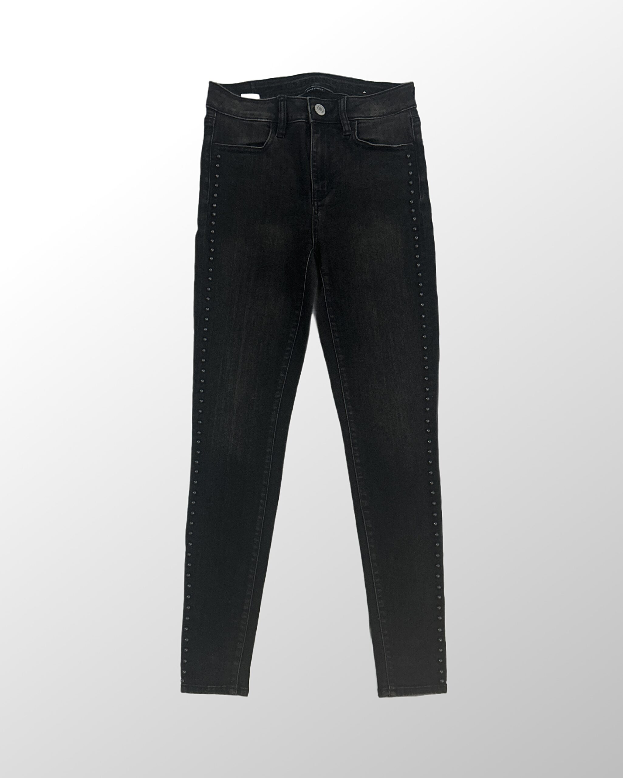 ג׳ינס סקיני לייקרה American eagle בגזרה גבוהה בצבע שחור בשילוב ניטים שחורים לאורך הצדדים! מידה 27